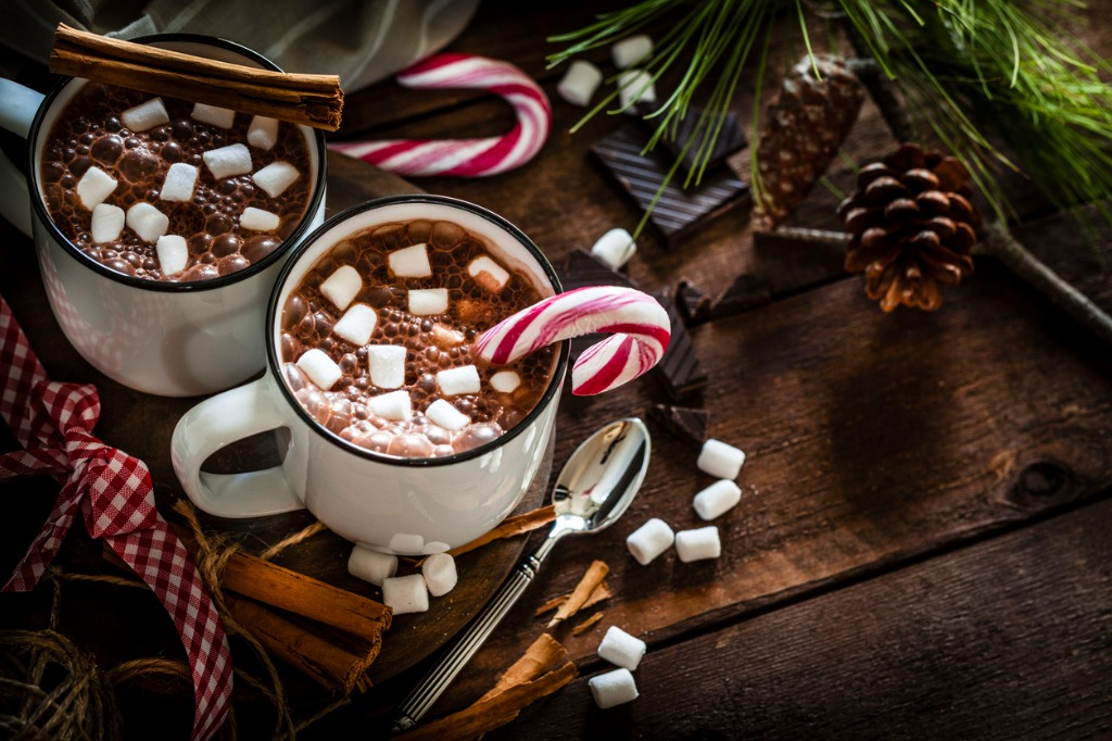 two homemade hot chocolate mugs with marshmallows on rustic wooden picture id872457042